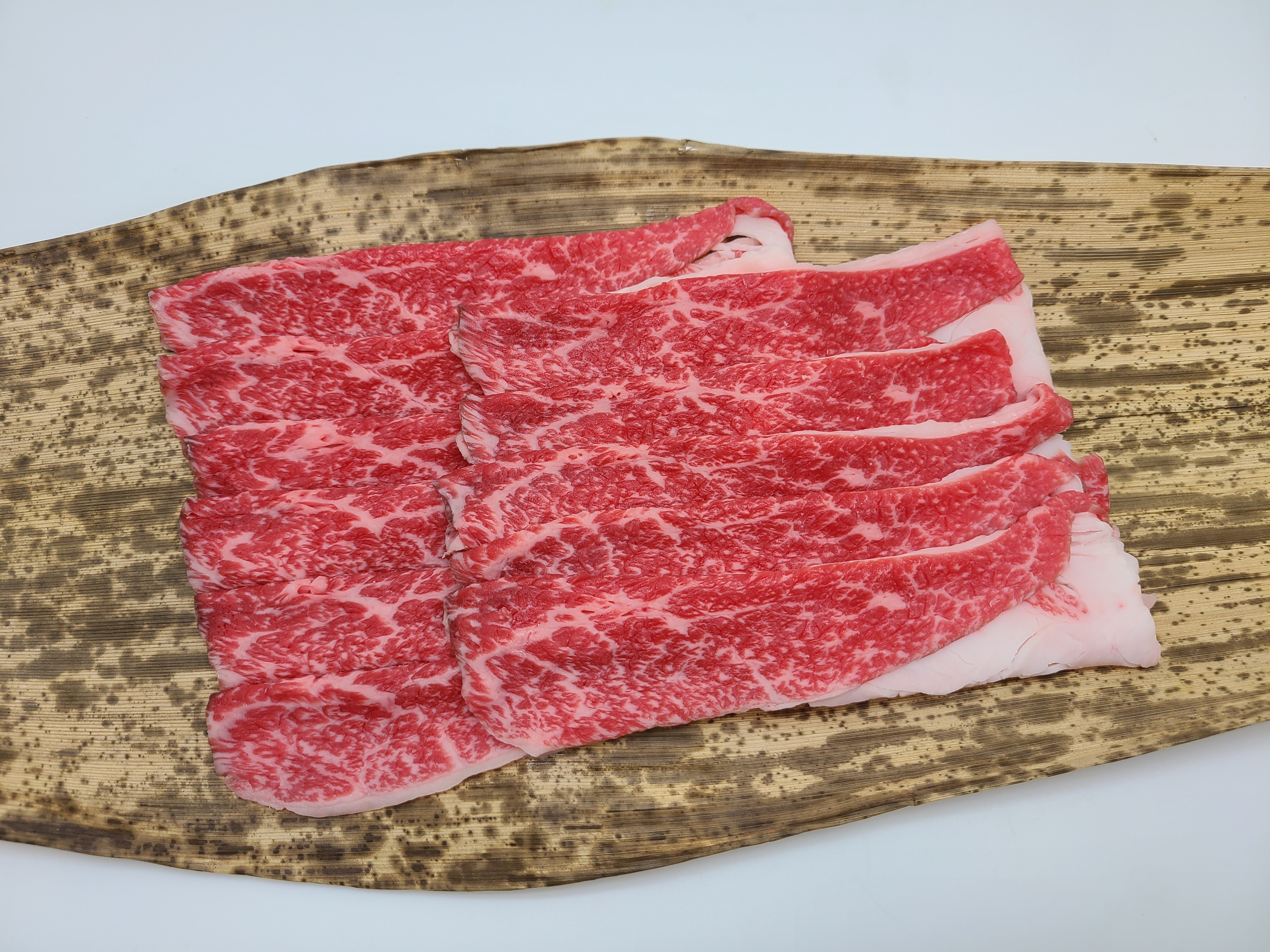 【直送】滋賀産黒牛 上バラすき焼き用250ｇ（10点入）